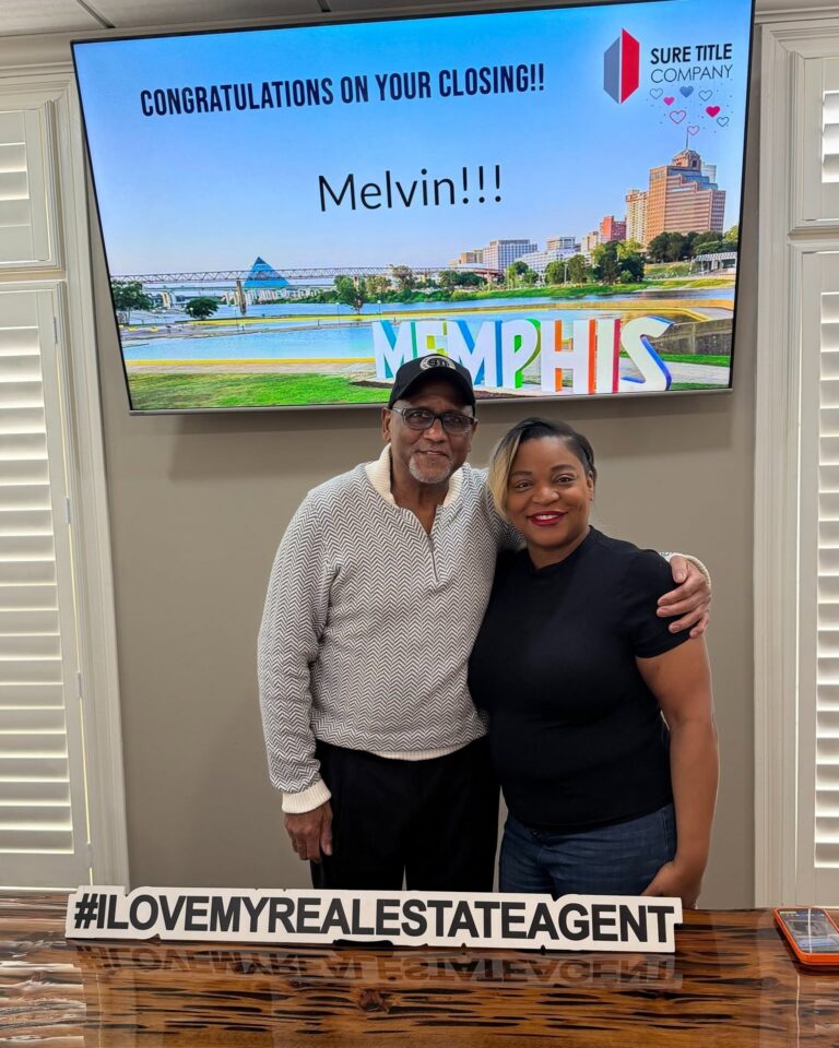 Happy clients and Realtors celebrating closing day at Sure Title Company, Memphis