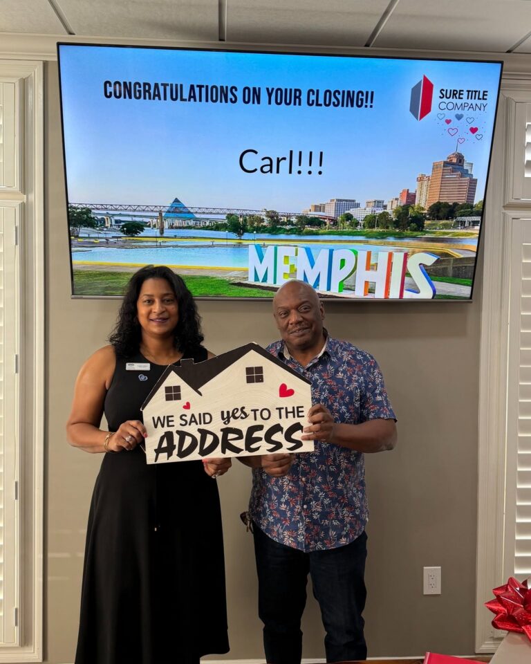 Happy clients and Realtors celebrating closing day at Sure Title Company, Memphis